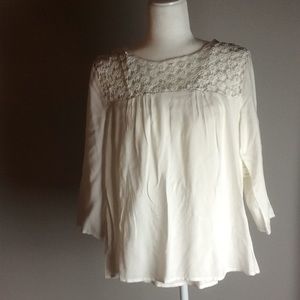 White, boho inspired time with crochet neckline